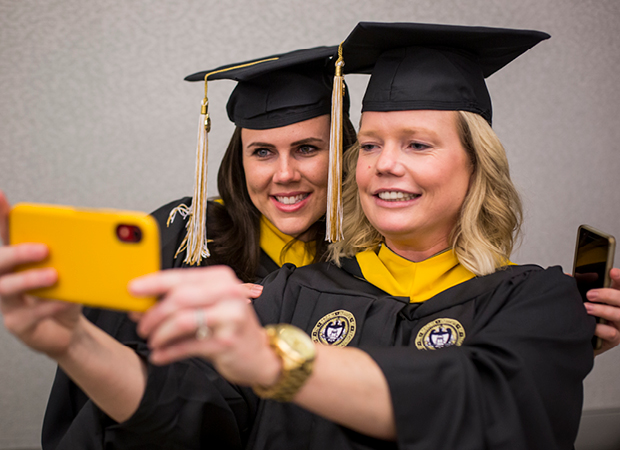 PMOSH graduates taking selfie