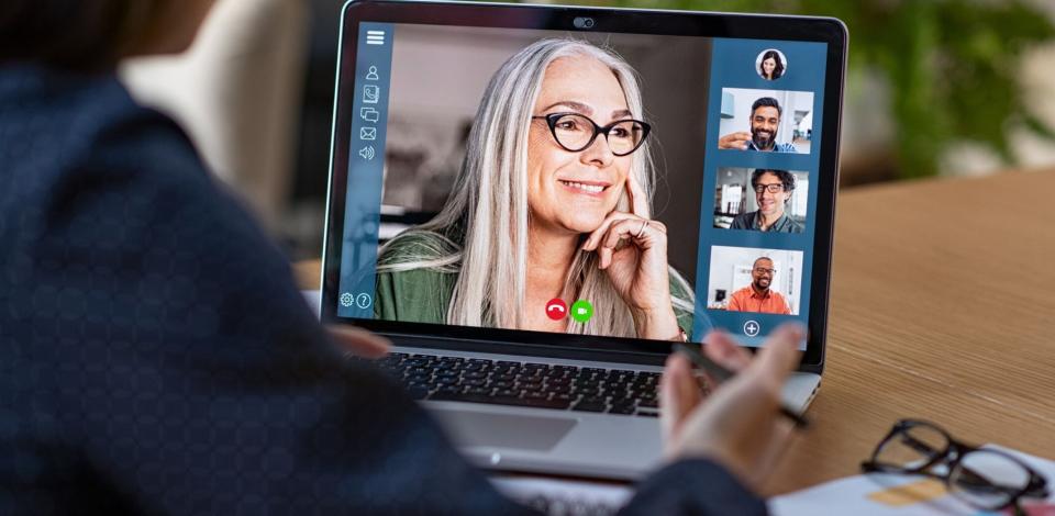 Inclusive leader running a virtual meeting with diverse team