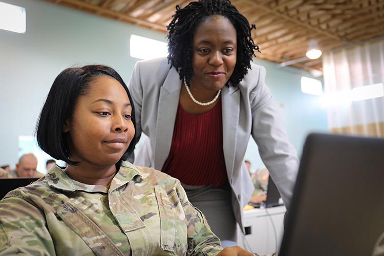 Transitioning military member and working professional collaborating over computer