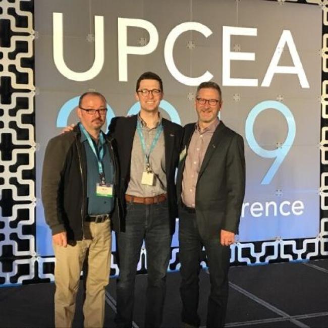 The Marketing & Digital Strategy Team on stage after presentation at UPCEA
